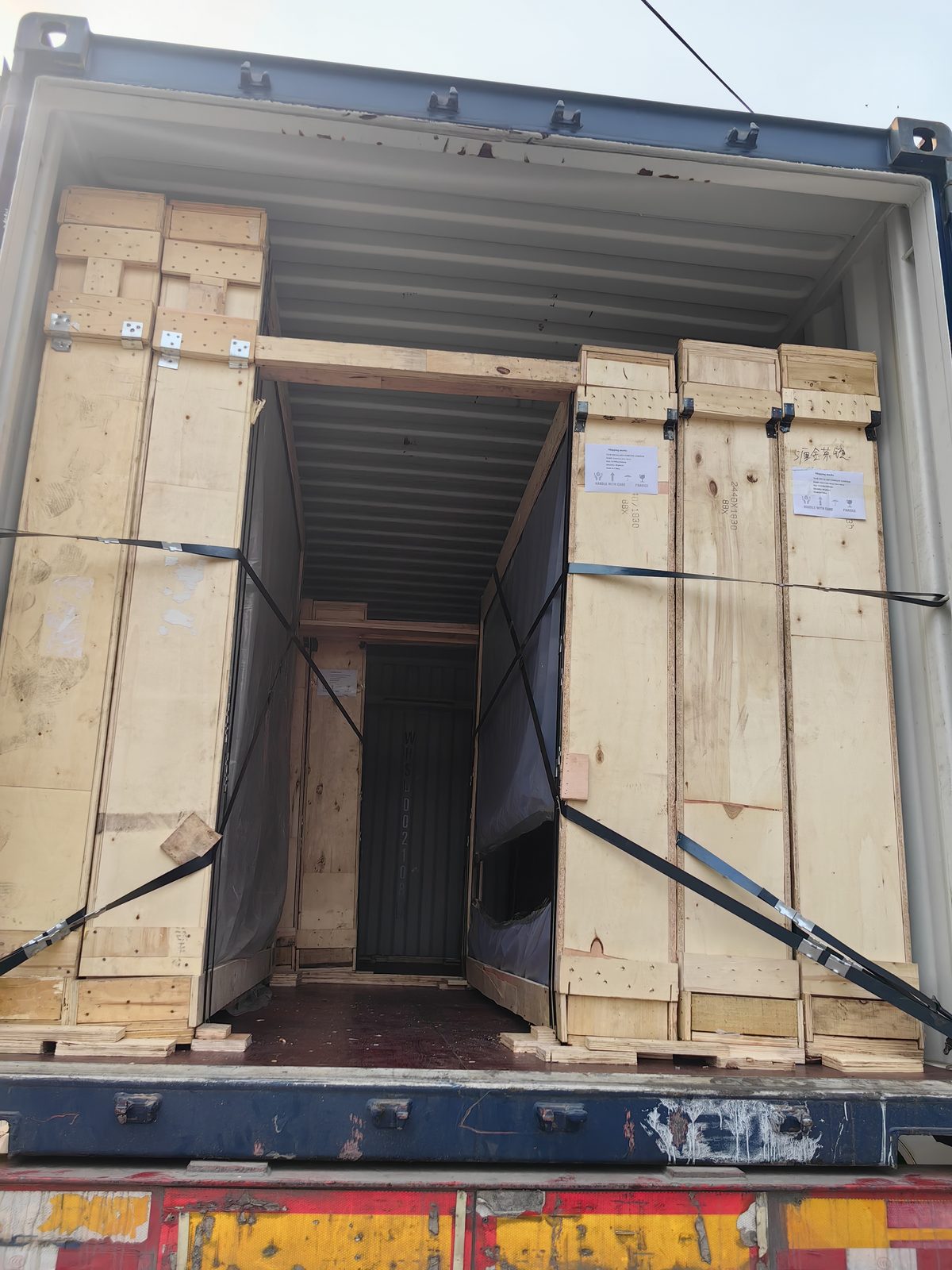 Glass export crates secured inside a container