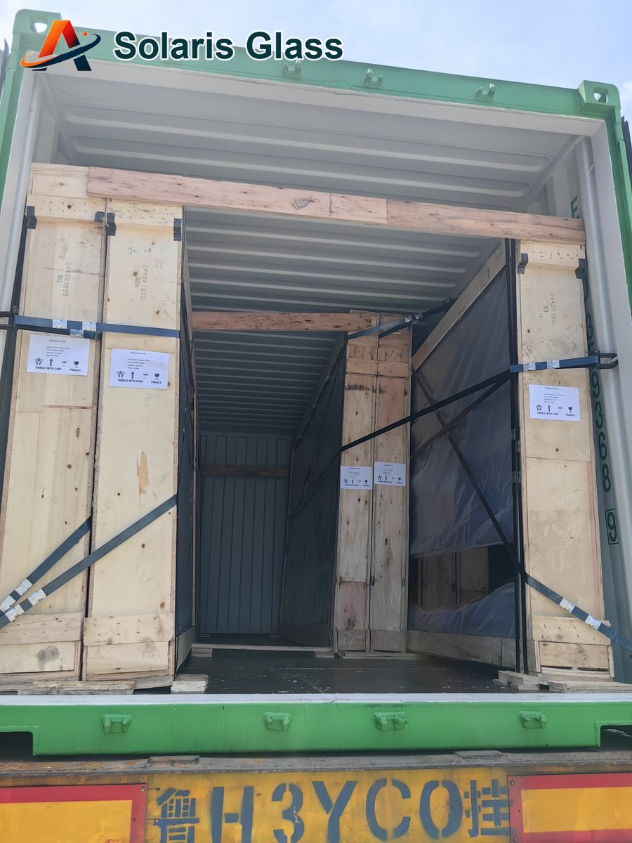 Wooden glass crates secured inside an export container