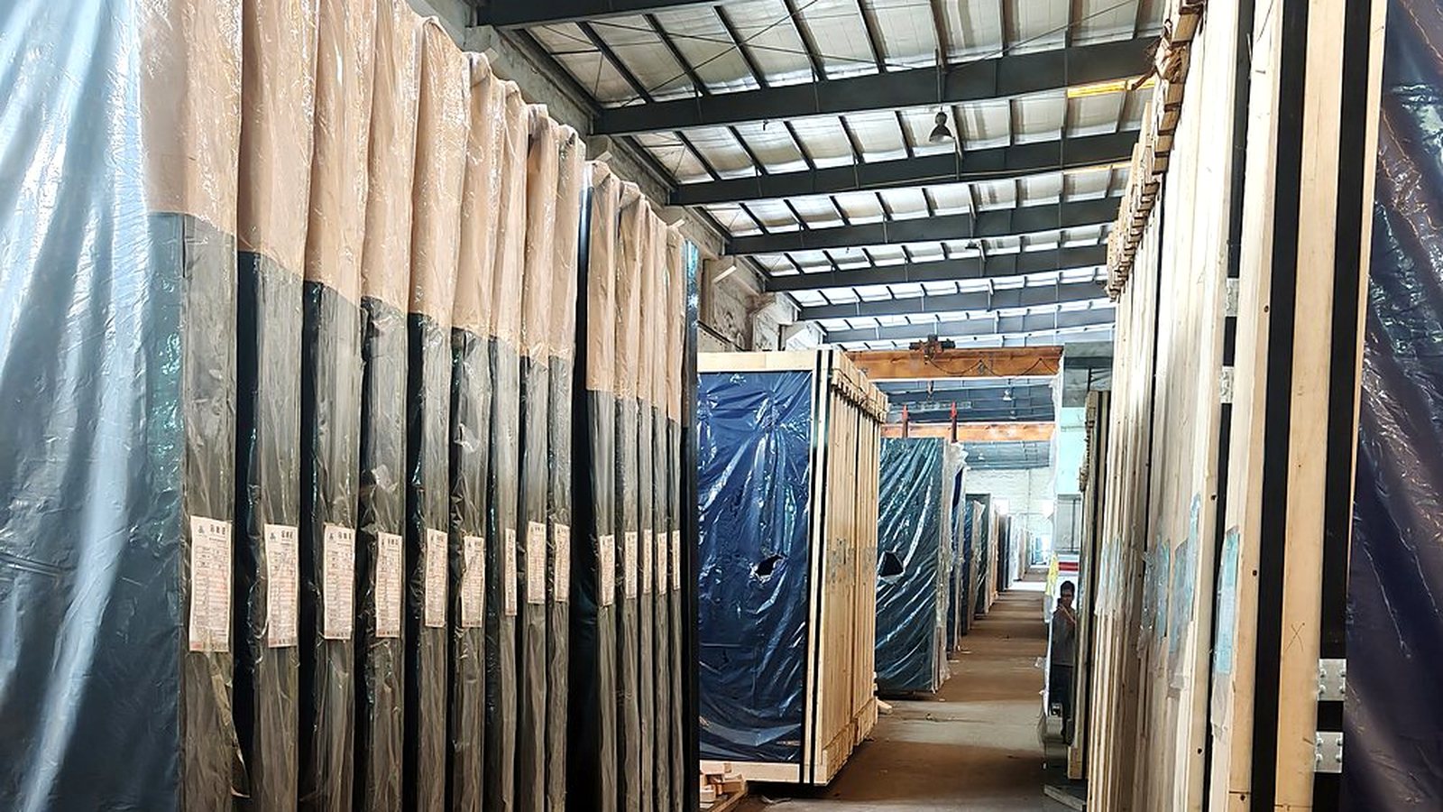 Glass stock stored on warehouse racks